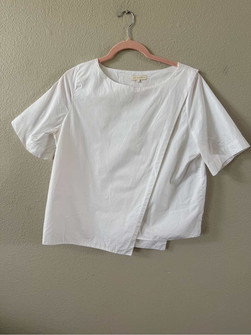Ann Mashburn white asymmetric top
